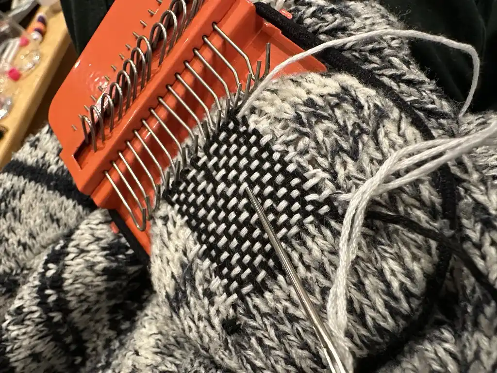 picture of loom attached to weave on jumper